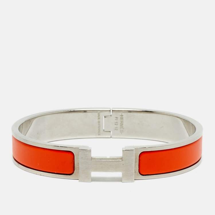 Pre Owned Hermes Clic HH Orange Enamel Palladium Plated Bracelet
