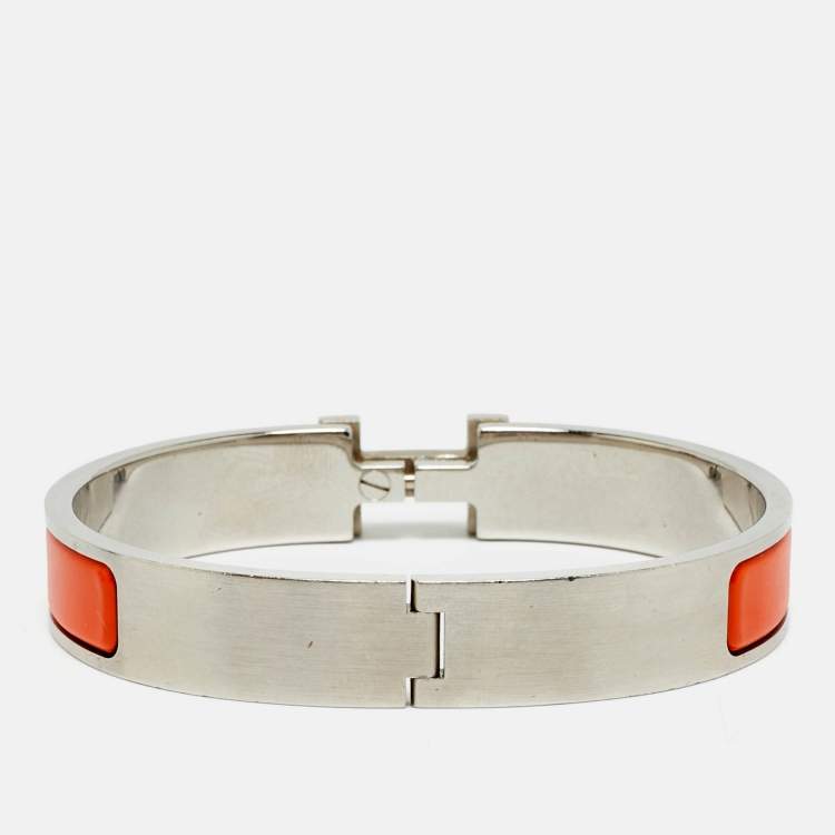 Pre Owned Hermes Clic HH Orange Enamel Palladium Plated Bracelet