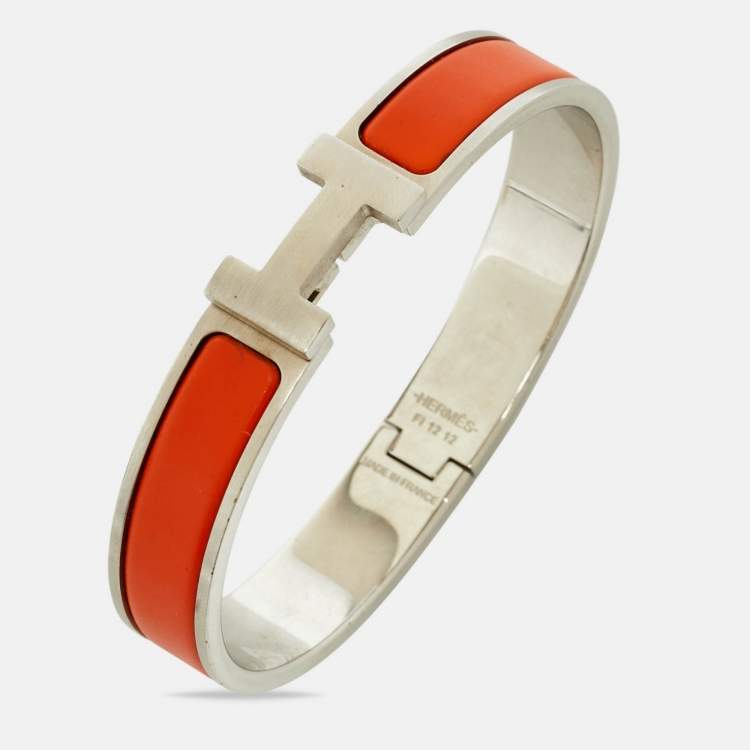 Pre Owned Hermes Clic HH Orange Enamel Palladium Plated Bracelet