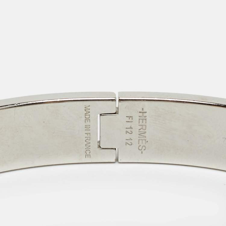 Pre Owned Hermes Clic HH Orange Enamel Palladium Plated Bracelet