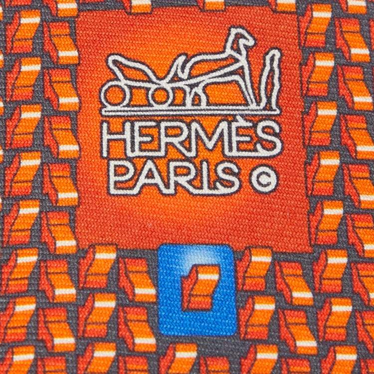 مملوكة مسبقًا Hermès Orange & Black Motif Print Silk Tie