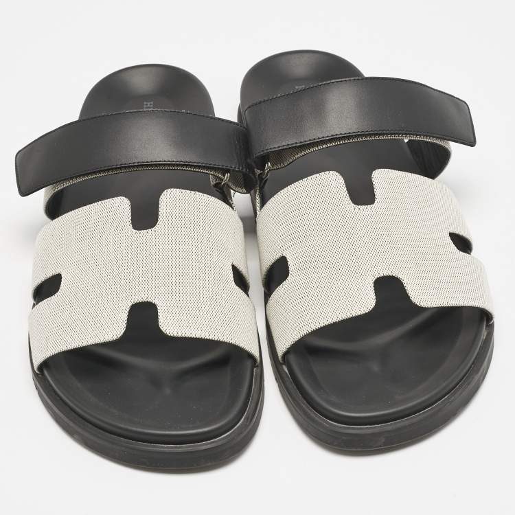 مملوكة مسبقًا Hermès Black/Off White Leather and Canvas Chypre Sandals Size 46
