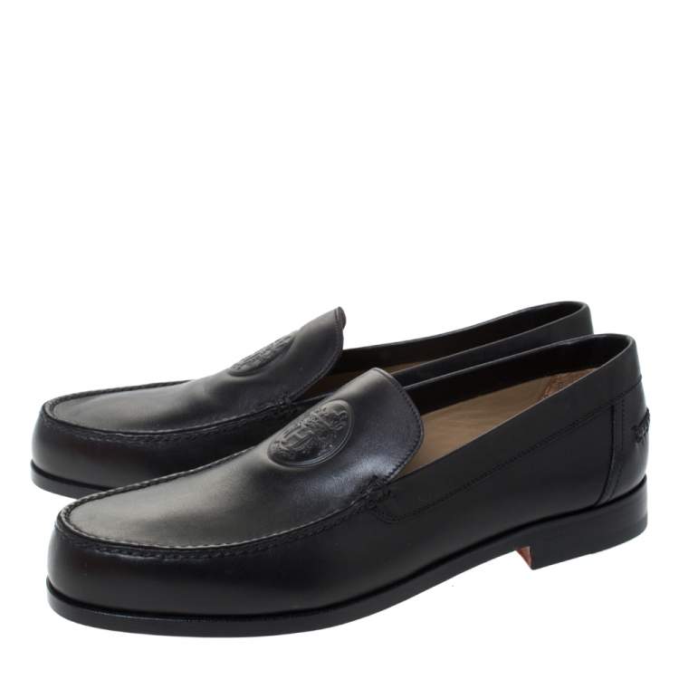 Pre Owned Hermes Black Logo Embossed Leather Slip On Loafers Size 41.5