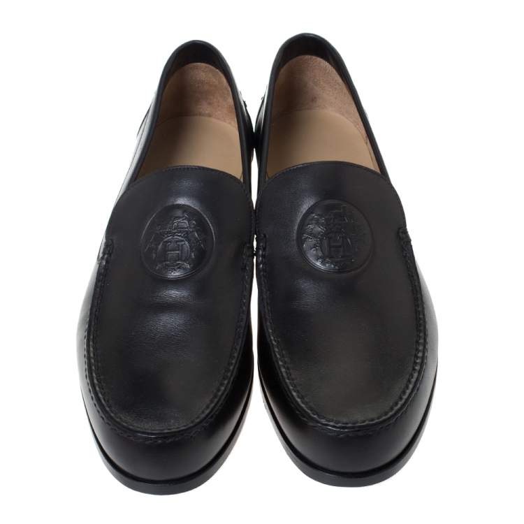 Pre Owned Hermes Black Logo Embossed Leather Slip On Loafers Size 41.5