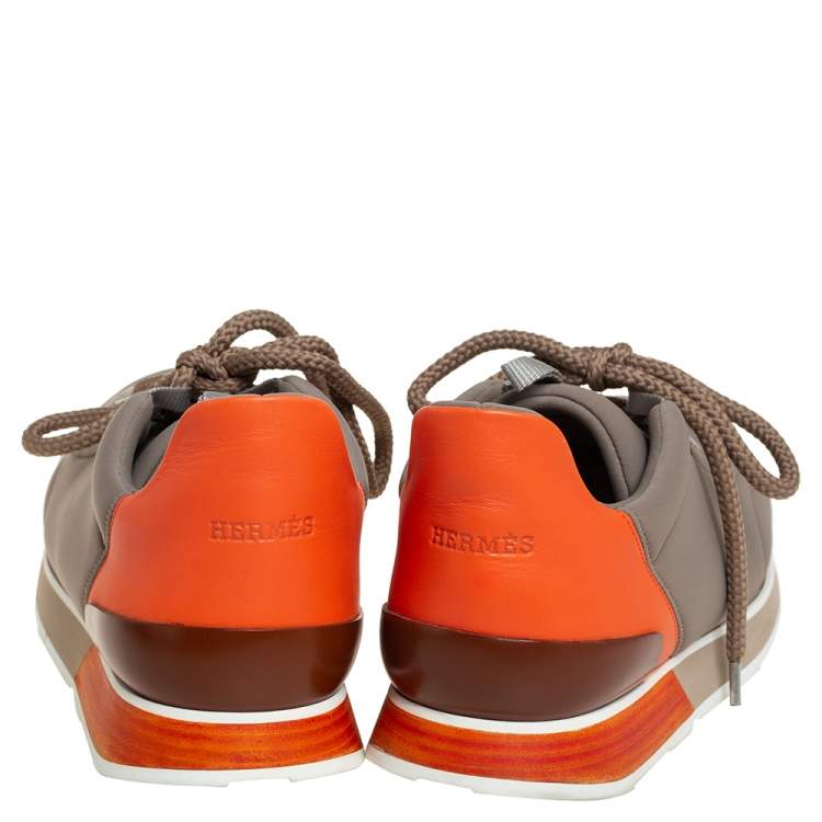 Pre Owned Hermés Grey/Orange Neoprene And Leather Miles Low Top Sneakers Size 44.5
