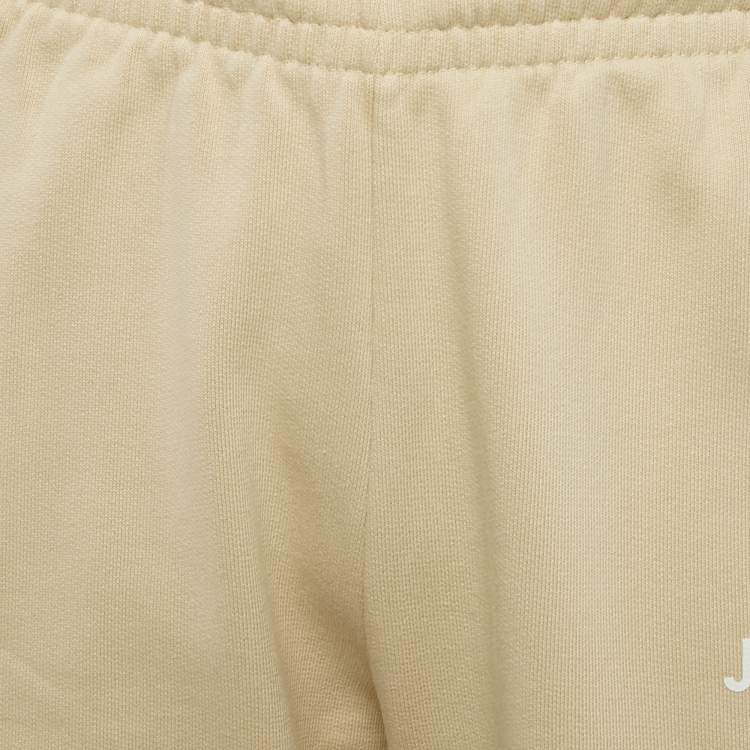 مملوكة مسبقًا بنطلون جاكيموس بيج بشعار قطن مقاس كبير