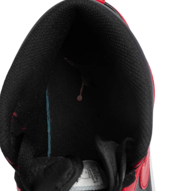 مملوكة مسبقًا Nike Jordan Black/Red Leather and Fabric 1 Mid Sneakers Size 43