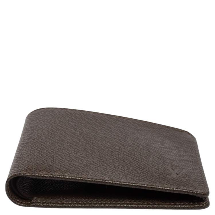 Pre Owned Louis Vuitton Brown Taiga Leather Bifold Compact Wallet