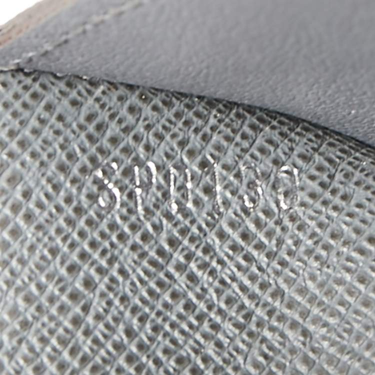 Pre Owned Louis Vuitton Glacier Taiga Leather Passport Holder