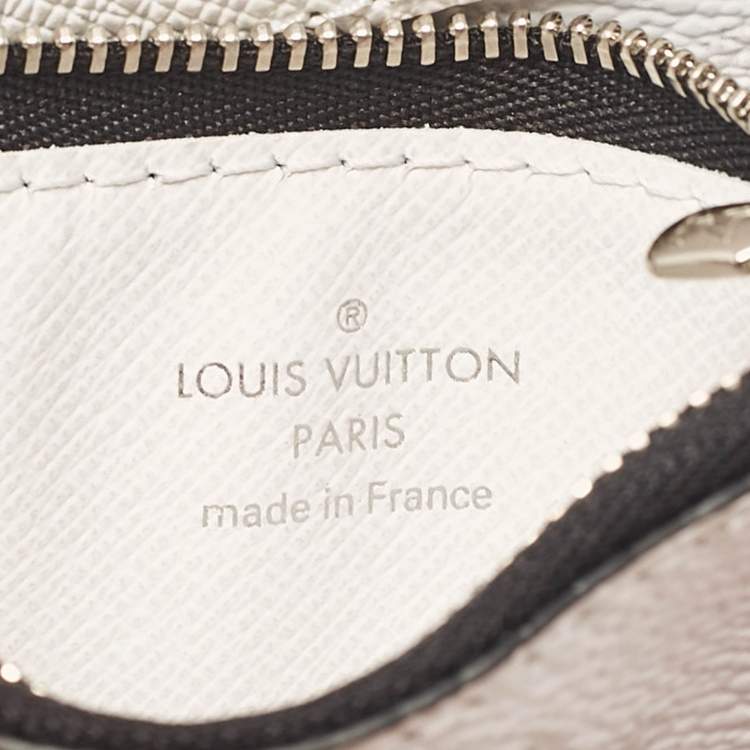 Pre Owned Louis Vuitton Optic White Taigarama Canvas Gaston Wearable Wallet
