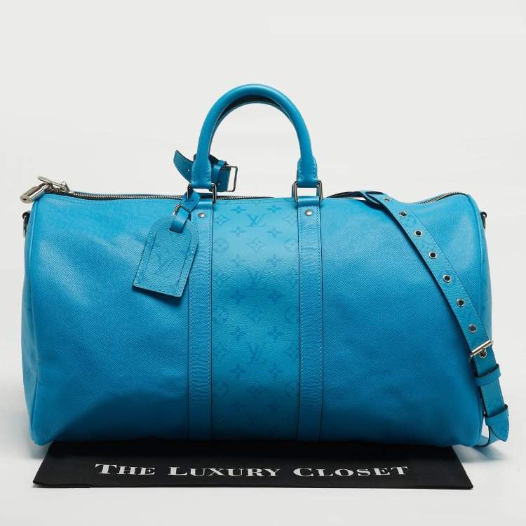 Pre Owned Louis Vuitton Keepall Bandoulière 50 Blue Lagoon Taigarama Leather Bag