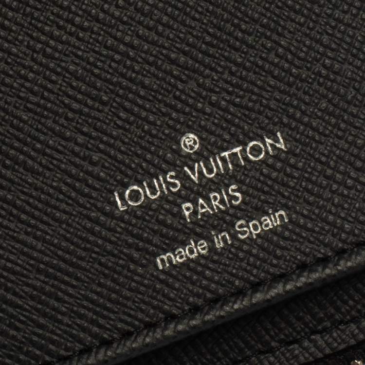 Pre Owned Louis Vuitton Black Taiga Leather Zippy Stripe Vertical Wallet