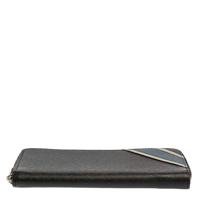 Pre Owned Louis Vuitton Black Taiga Leather Zippy Stripe Vertical Wallet