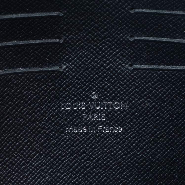 Pre Owned Louis Vuitton Black Taiga Leather Kasai Wristlet Bag