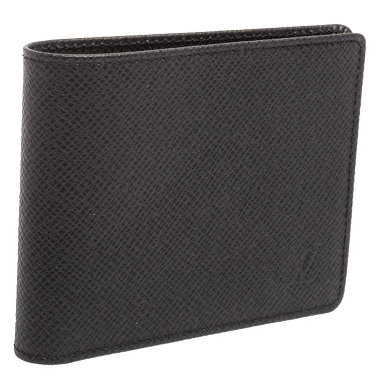 Pre Owned Louis Vuitton Black Taiga Leather Bifold Compact Wallet