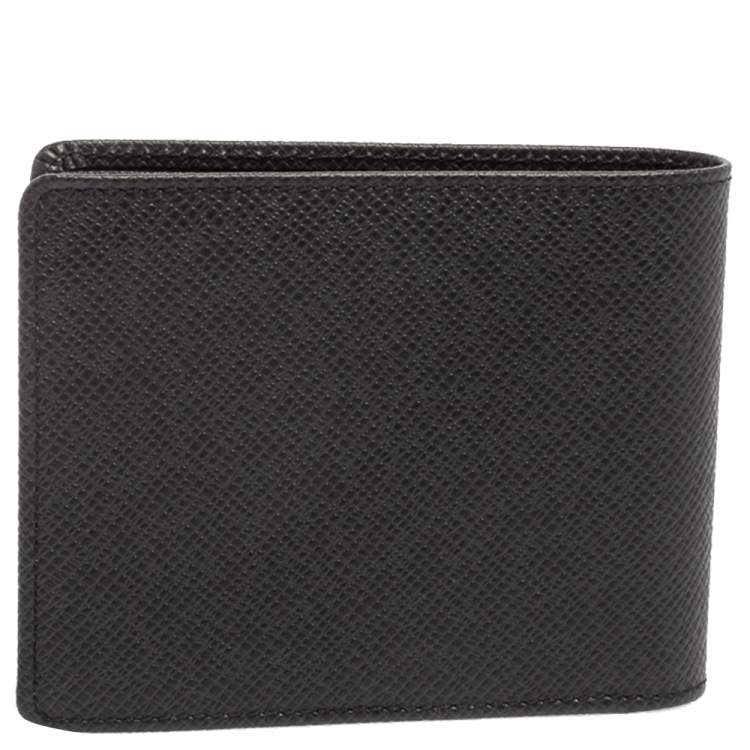 Pre Owned Louis Vuitton Black Taiga Leather Bifold Compact Wallet