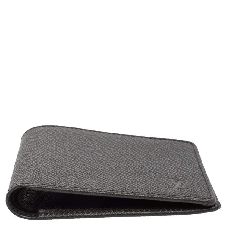 Pre Owned Louis Vuitton Black Taiga Leather Bifold Compact Wallet