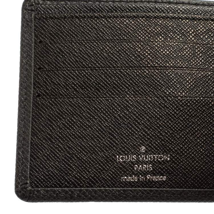 Pre Owned Louis Vuitton Black Taiga Leather Bifold Compact Wallet