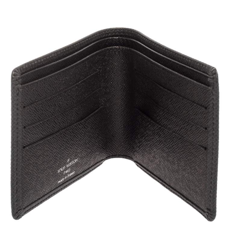 Pre Owned Louis Vuitton Black Taiga Leather Bifold Compact Wallet