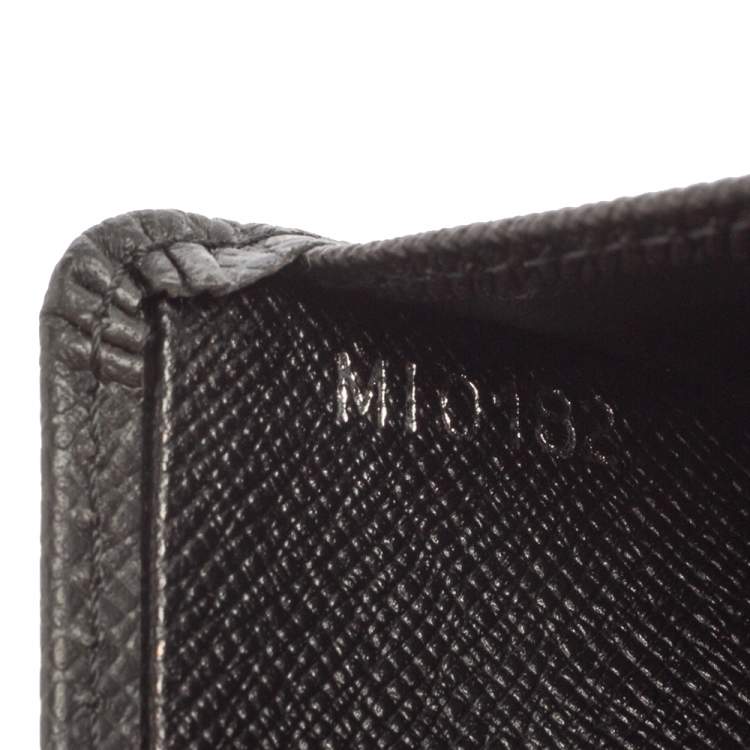 Pre Owned Louis Vuitton Black Taiga Leather Bifold Compact Wallet