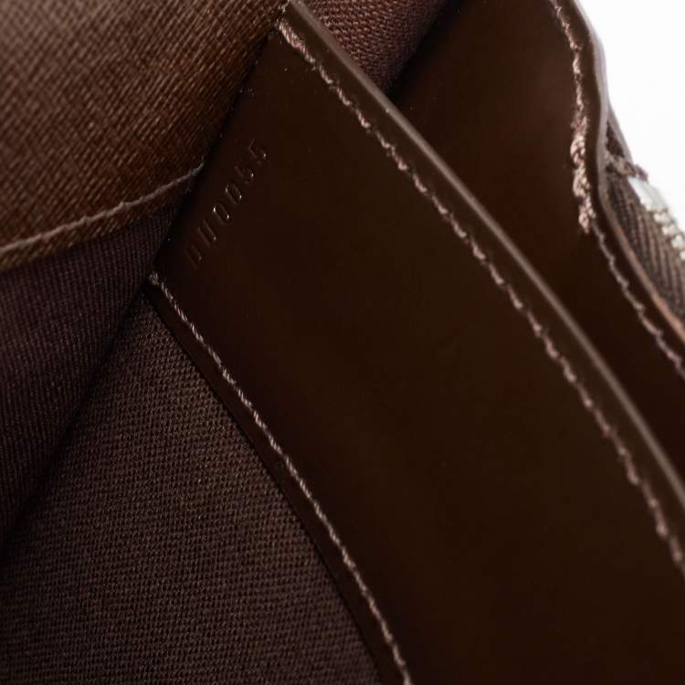 Pre Owned Louis Vuitton Brown Taiga Leather Minuto Portfolio Case