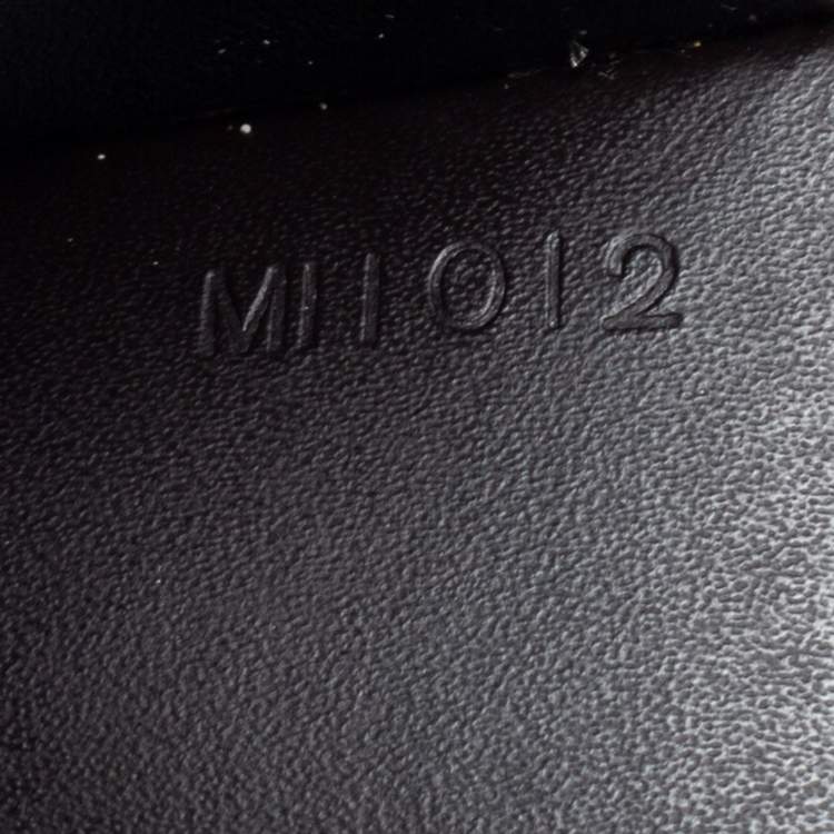 Pre Owned Louis Vuitton Dark Brown Leather Monogram Embossed Bifold Wallet 