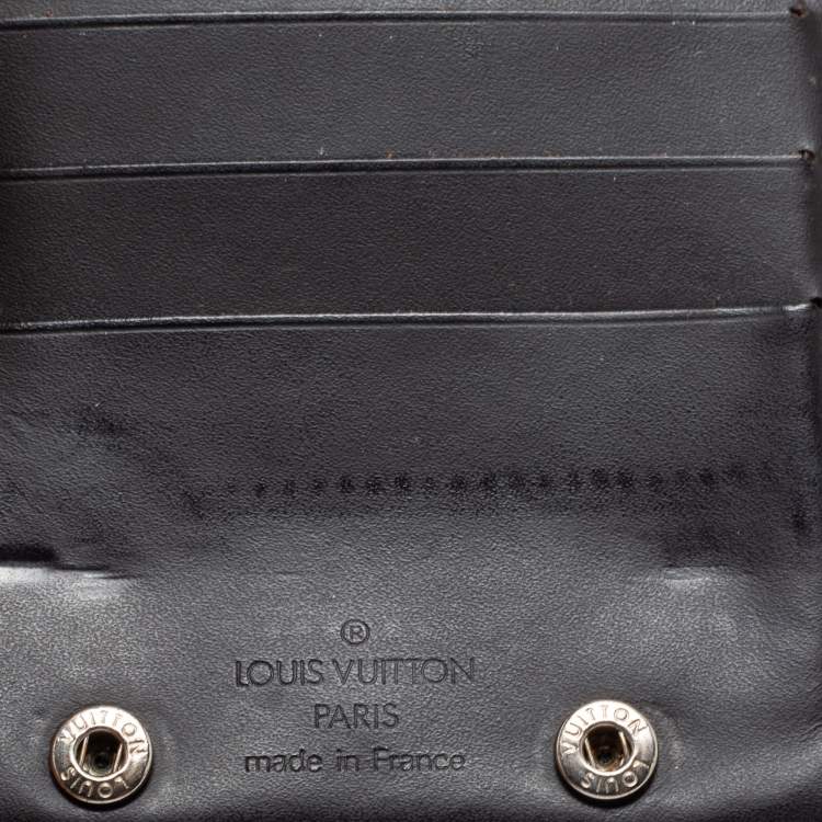 Pre Owned Louis Vuitton Dark Brown Leather Monogram Embossed Bifold Wallet 