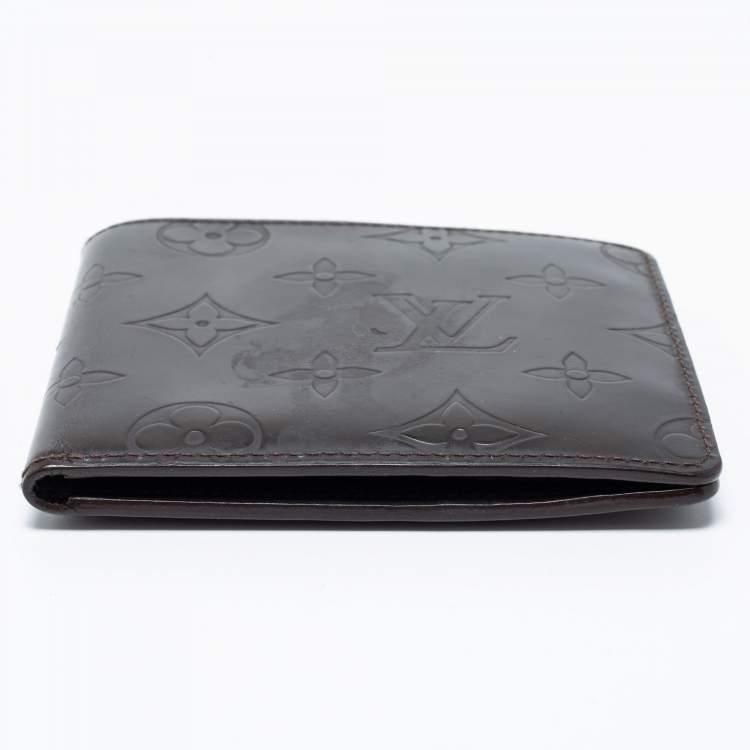 Pre Owned Louis Vuitton Dark Brown Leather Monogram Embossed Bifold Wallet 