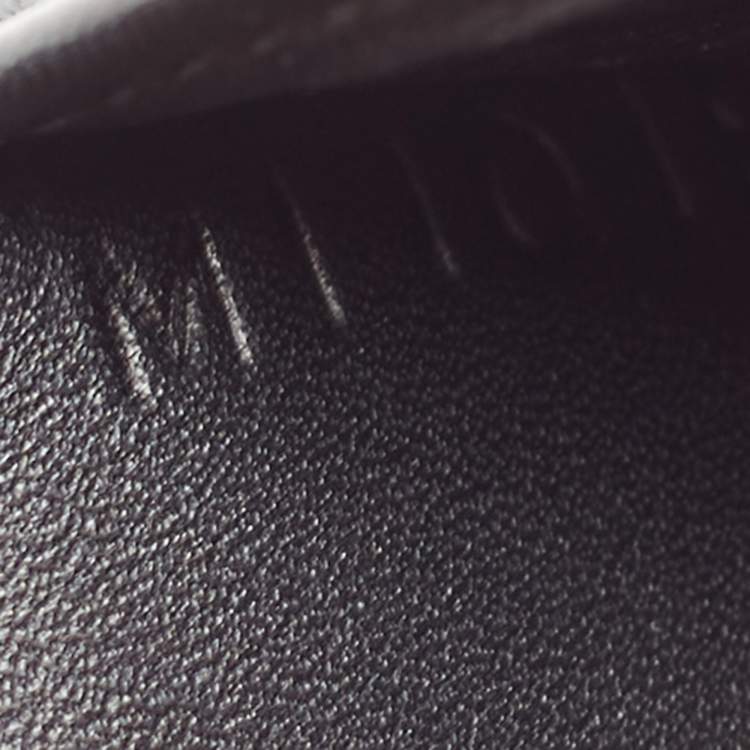 مملوكة مسبقًا Louis Vuitton Black Leather Perforated Logo Bifold Wallet