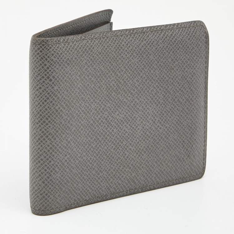 Pre Owned Louis Vuitton Grey Taiga Leather Bifold Wallet