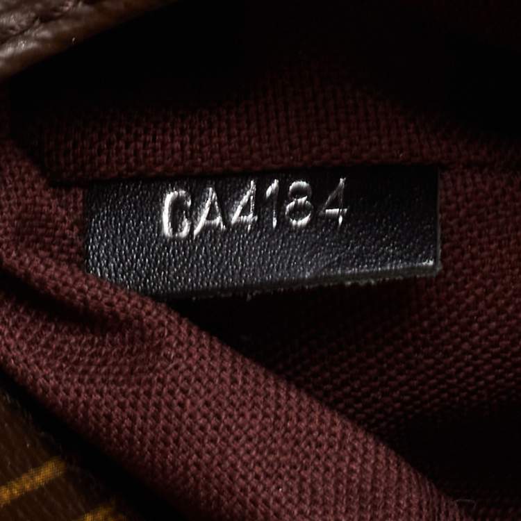 Pre Owned Louis Vuitton Monogram Canvas District PM Bag