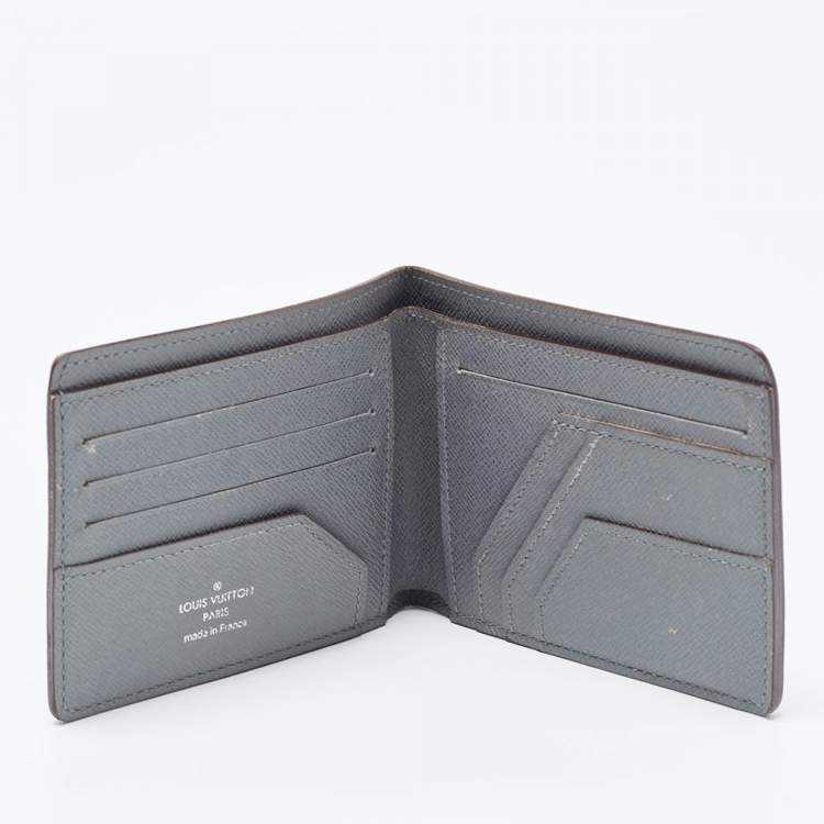 Pre Owned Louis Vuitton Grey Taiga Leather Bifold Wallet