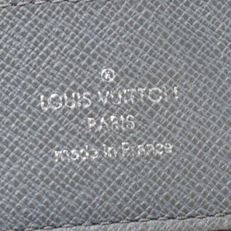 Pre Owned Louis Vuitton Grey Taiga Leather Bifold Wallet