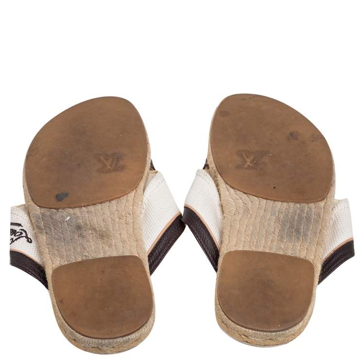 Pre Owned Louis Vuitton Canvas and Leather Logo Cross Strap Flat Sandals Size 41