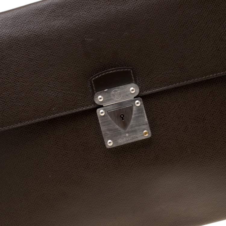 Pre Owned Louis Vuitton Brown Taiga Leather Minuto Portfolio Case