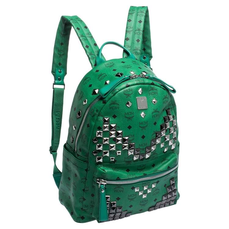 green mcm backpack