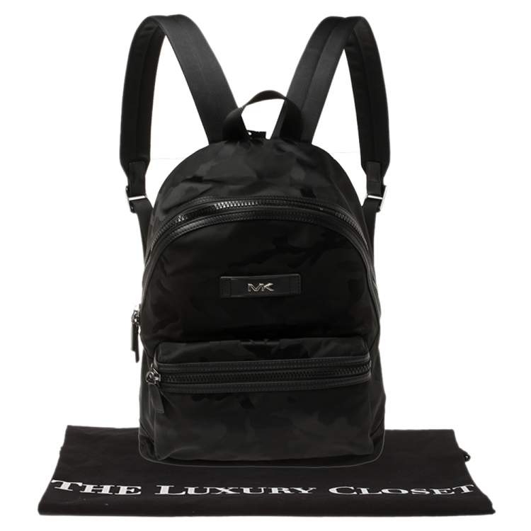 black michael kors backpack purse
