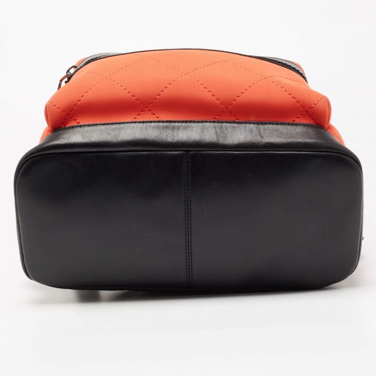 Pre Owned Michael Kors Orange/Black Quilted Neoprene And Leather Odin Backpack