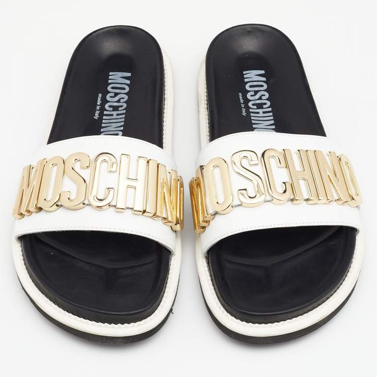 Pre Owned Moschino White/Black Leather Logo Plaque Flat Slide Sandals Size 41