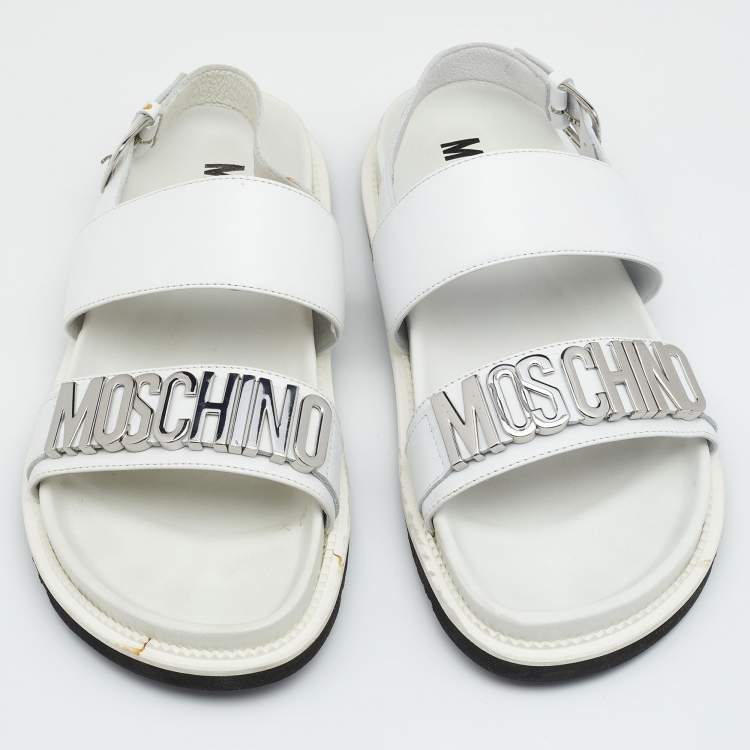 Pre Owned Moschino White Leather Logo Plaque Flat Sandals Size 42