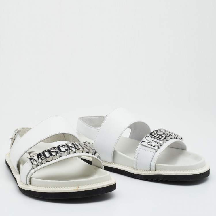 Pre Owned Moschino White Leather Logo Plaque Flat Sandals Size 42