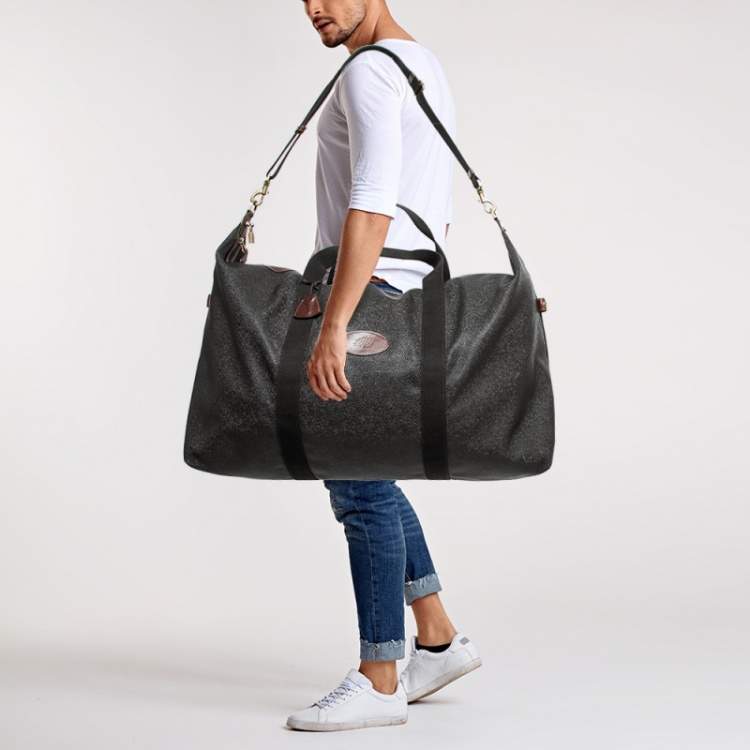 MULBERRY CLASSIC WEEKEND BAG, black leather with brown leather trims and  two top handles, zip top closure and fabric lining, 44cm x 36cm H x 14cm  plus a Butler & Wilson evening