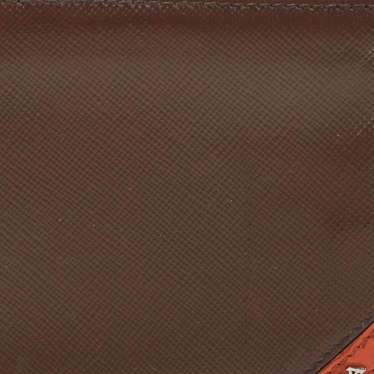 Pre Owned Prada Dark Brown/Orange Saffiano Metal Leather Bi Fold Wallet