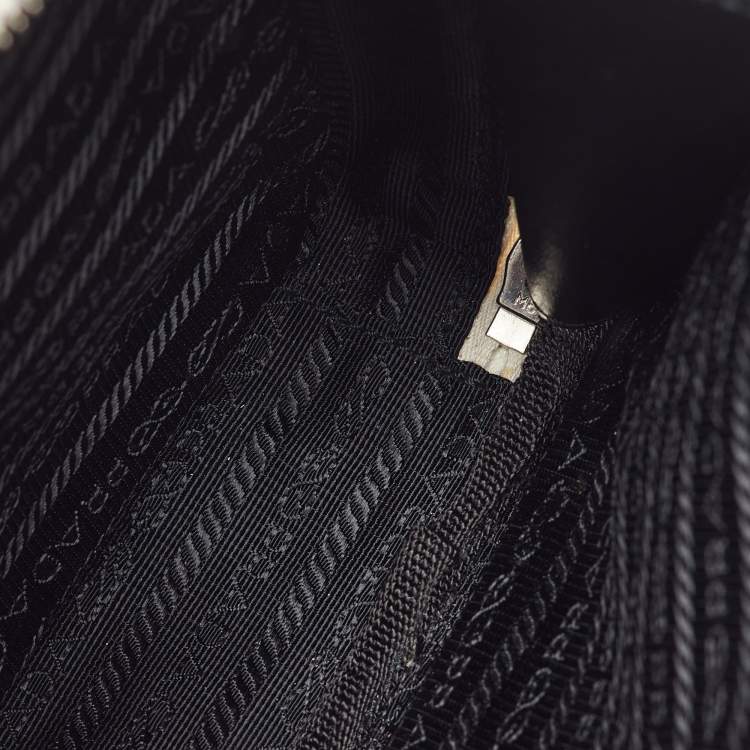 Pre Owned Prada White Leather Logo Embossed Vertical Shape Shoulder Bag