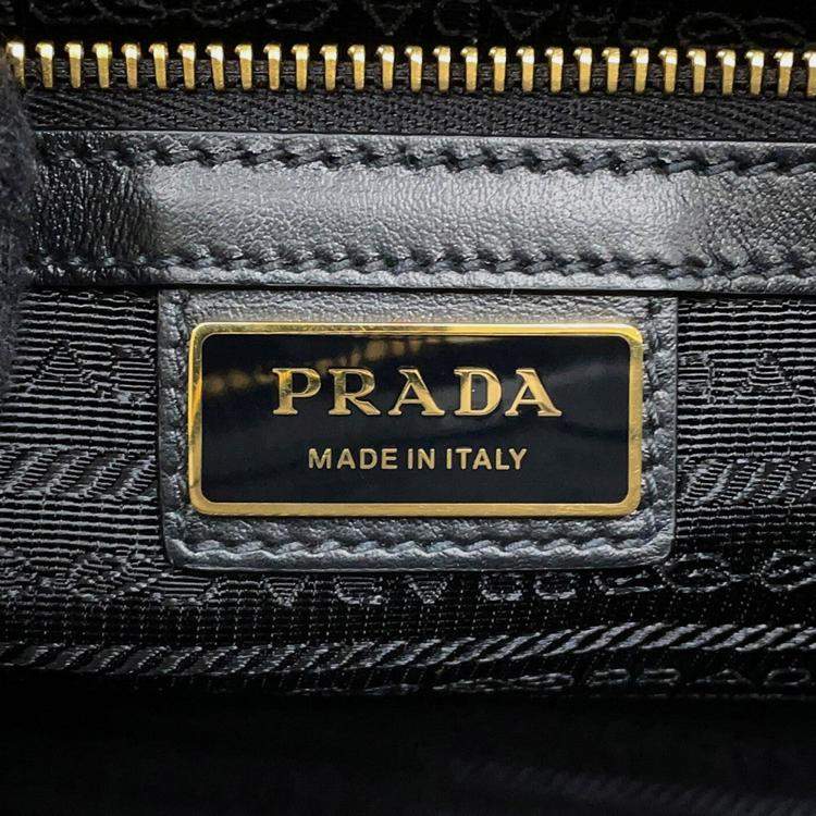 مملوكة مسبقًا Prada Symbol Embroideryfabric Travel Bag Beige/Black Canvas Saffiano Leather 