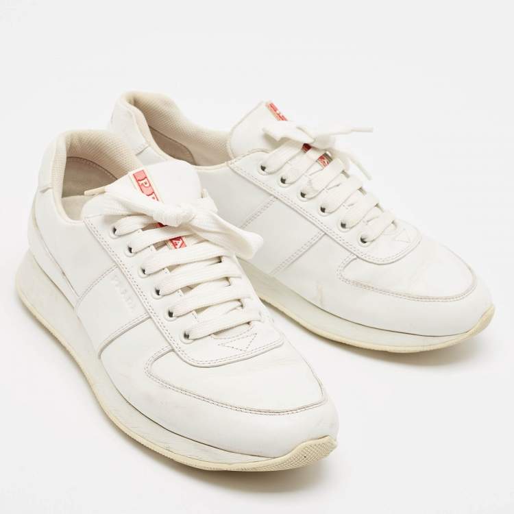 مملوكة مسبقًا Prada White Leather Lace Up Sneakers Size 41.5