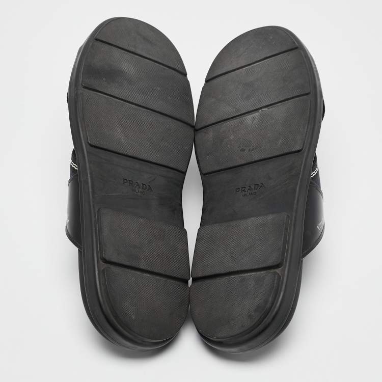 Pre Owned Prada Blue Leather and Canvas Logo Tape Crisscross Slides Size 43