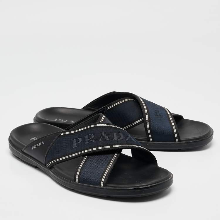 Pre Owned Prada Blue Leather and Canvas Logo Tape Crisscross Slides Size 43