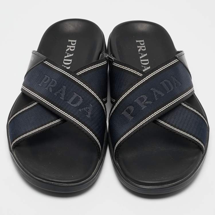 Pre Owned Prada Blue Leather and Canvas Logo Tape Crisscross Slides Size 43