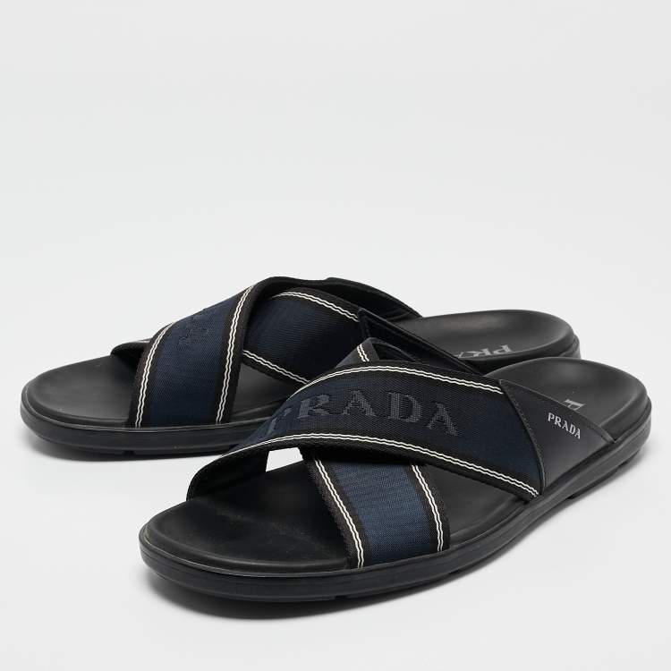 Pre Owned Prada Blue Leather and Canvas Logo Tape Crisscross Slides Size 43